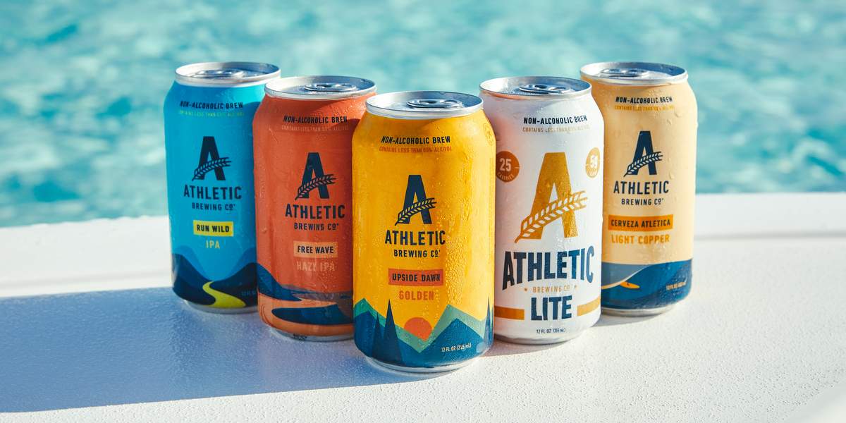 Athletic Brewing's beer lineup by the pool