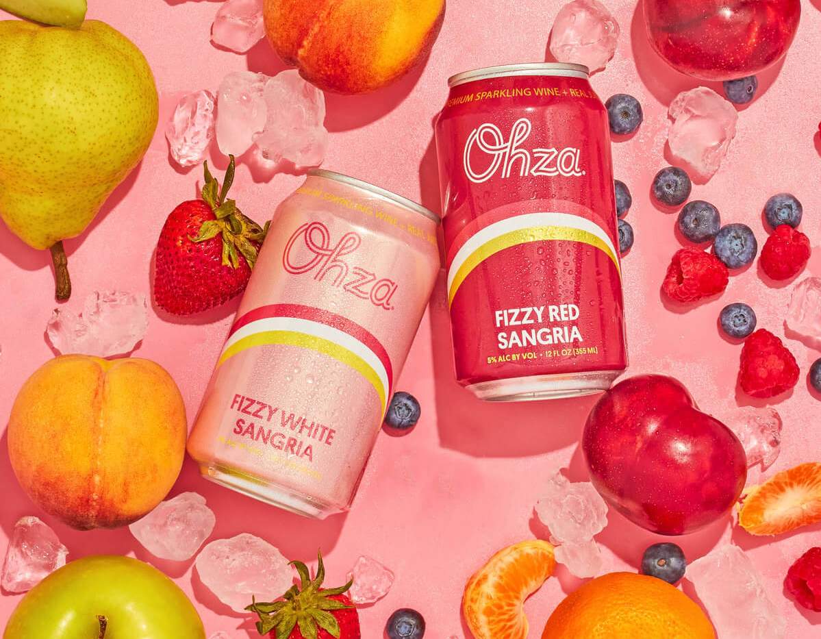 Ohzz Sangria in cans with fruit on the background rad yo