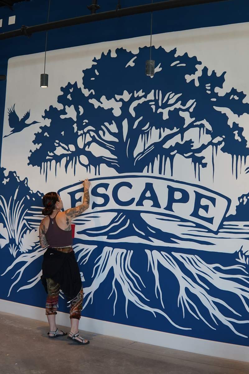 Escape Brewing expands and becomes The Collective at Escape mural painting