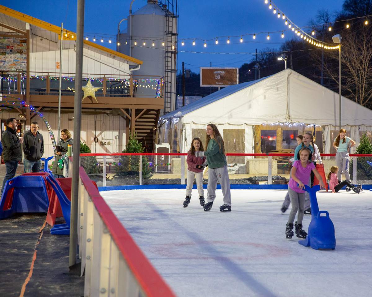 Fifty West Brewing ice skating rink people skating