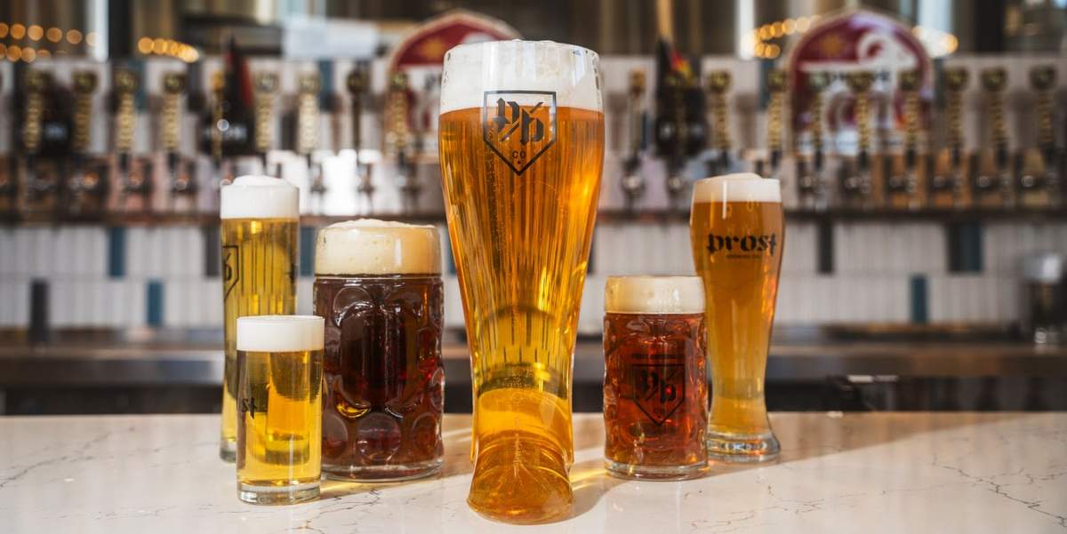 Prost Brewing beer in glasses at a bar